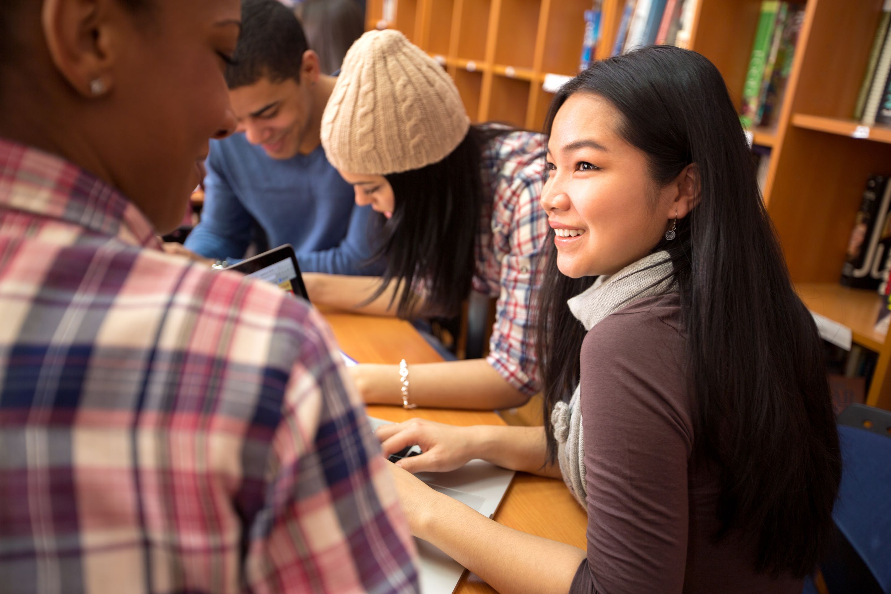 Essays In Science A Group Of Students Working On An Essay In The Library Together Theme For English B Essay also Persuasive Essay Samples High School Group Work That Really Works Edutopia Business Studies Essays