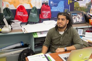 WHEELS college counselor Daniel Morales-Armstrong, at his desk in the College Access Room.