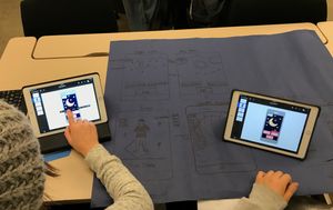 Students designing a mobile app