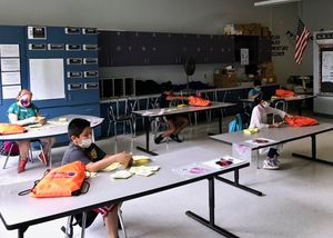 Students in Meriden work on classwork at summer school.