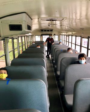 Students ride the bus in Premont, Texas.