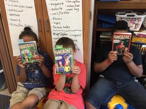 Children reading graphic novels