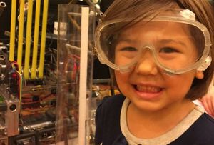 Child with safety goggles on