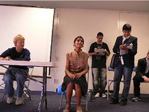 High school students presenting a mock court hearing