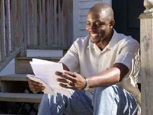 Parent Reading a Letter