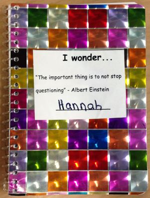Hannah's colorful sparkly journal with a cover sticker that says, I wonder . . . "The important thing is to not stop questioning" --Albert Einstein, and then a line for the student's name