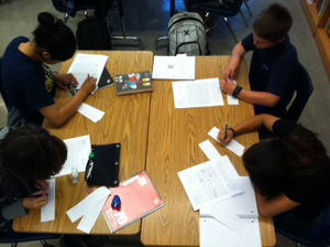 Students writing together