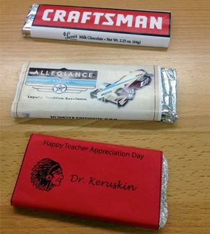 Three wrapped candy bars; two from the market, one from teacher appreciation