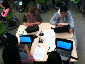 Students working in stationary chairs