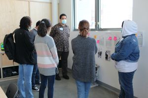 students looking at documentations panels